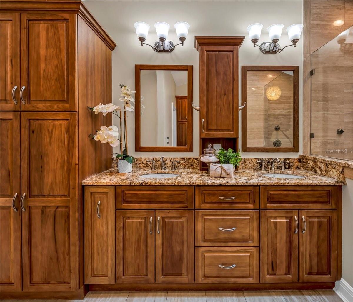 Dual sink vanity and plenty of cabinetry for your linens