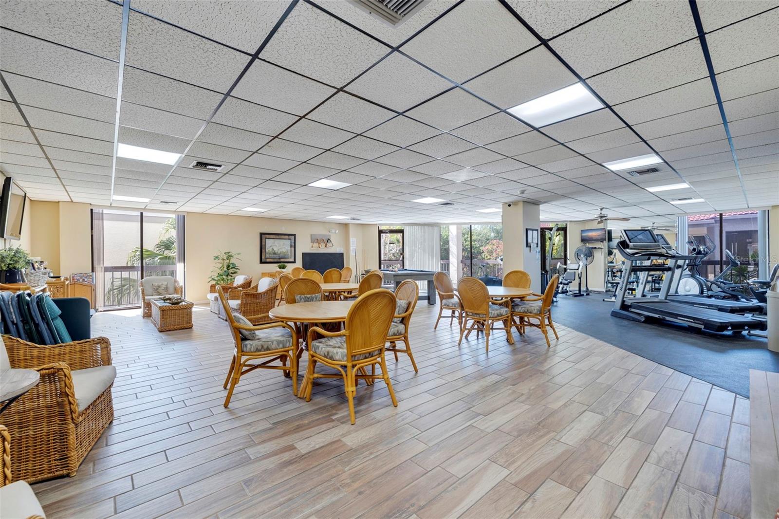SOCIAL/RECREATION VIEW WITH POOL TABLE AND FITNESS AREA