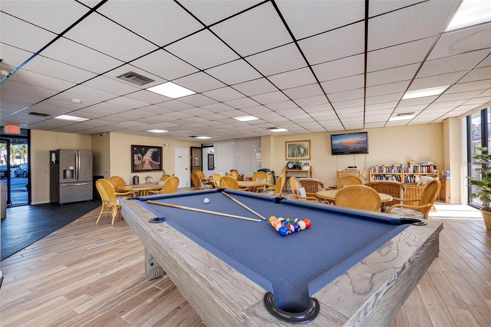 PLAY POOL IN THE SOCIAL.RECREATION ROOM