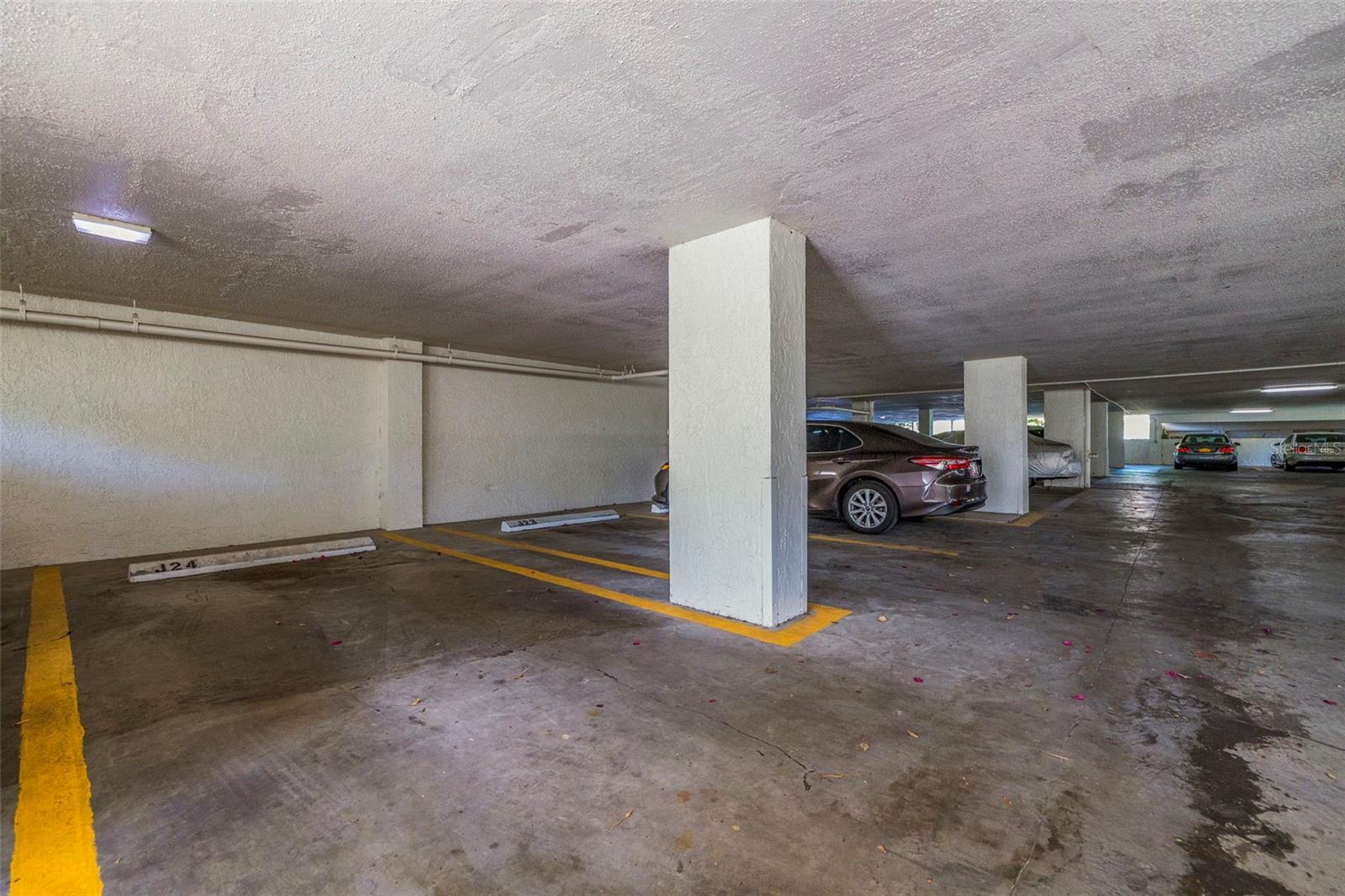 COVERED PARKING SPOT J-24 THAT IS IN CLOSE PROXIMITY TO YOUR NEW CONDO...NO STAIRS TO CLIMB...