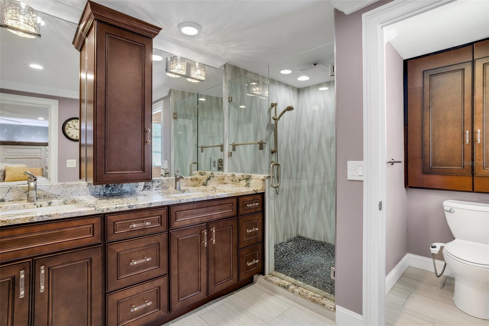Primary Bathroom with 2 sinks, extra large shower, hotwater on demand and solid wood cabinets