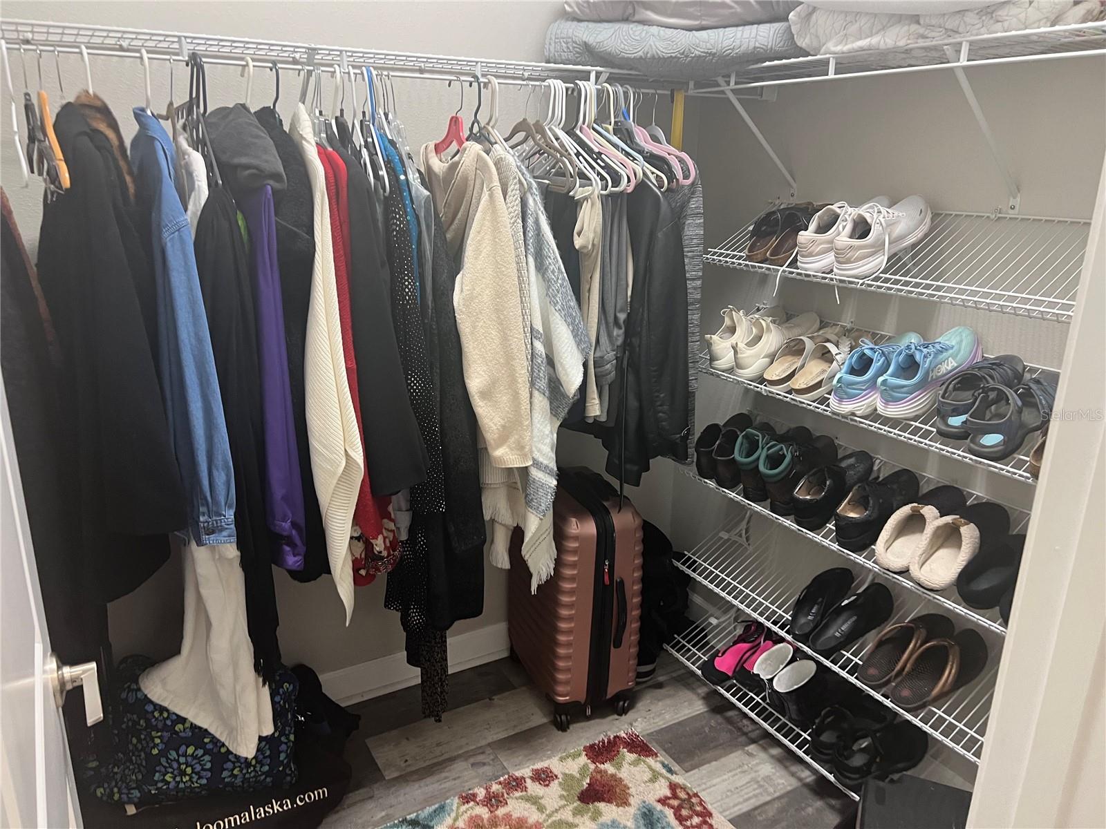 Master BR walk in closet with shoe rack