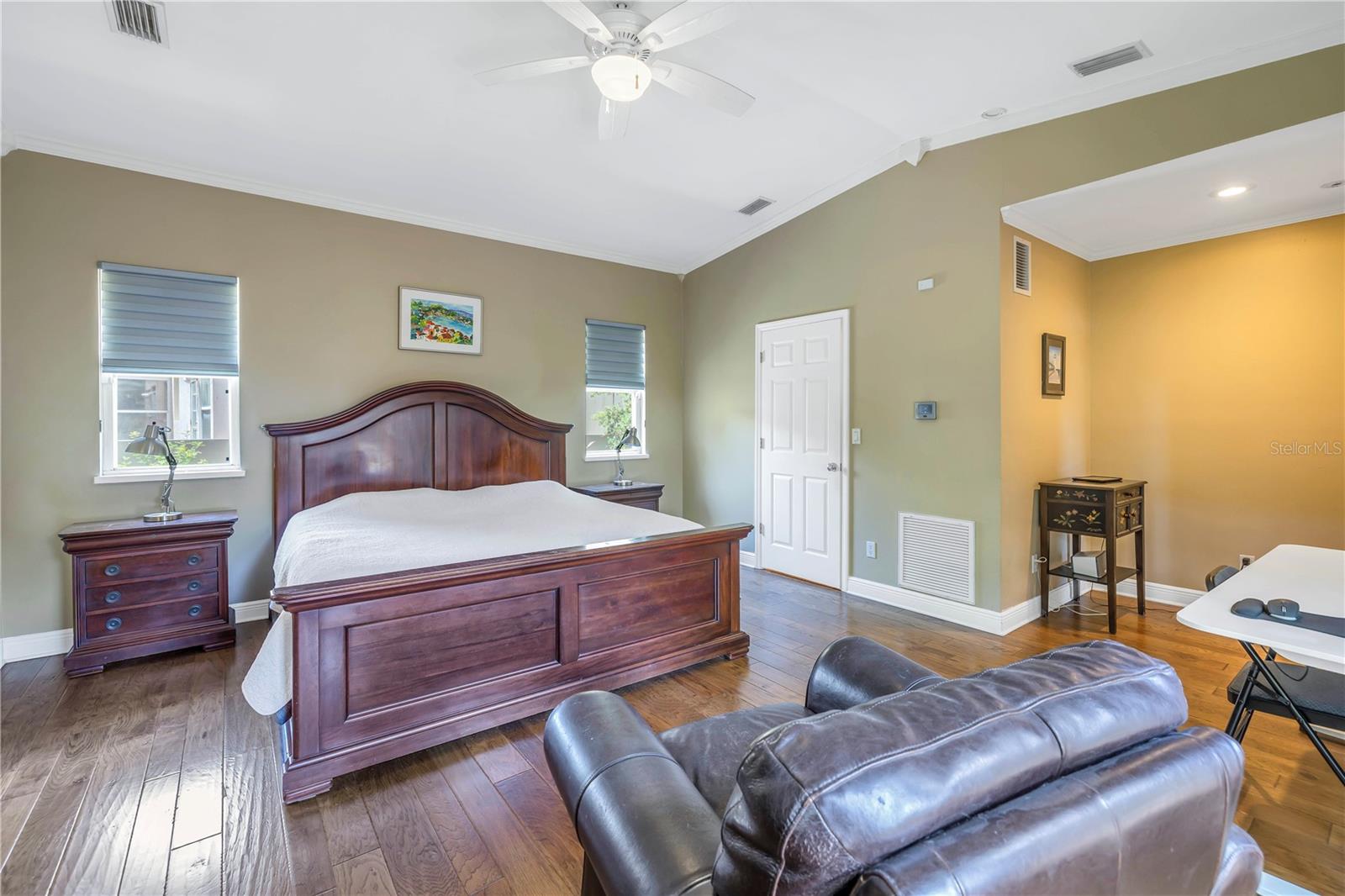 Spacious Primary Bedroom suite with pitched ceilings.