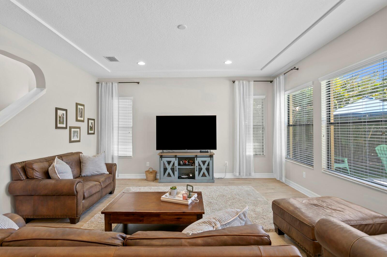 Frame this area with a tv, entertainment center, and make this space your own!