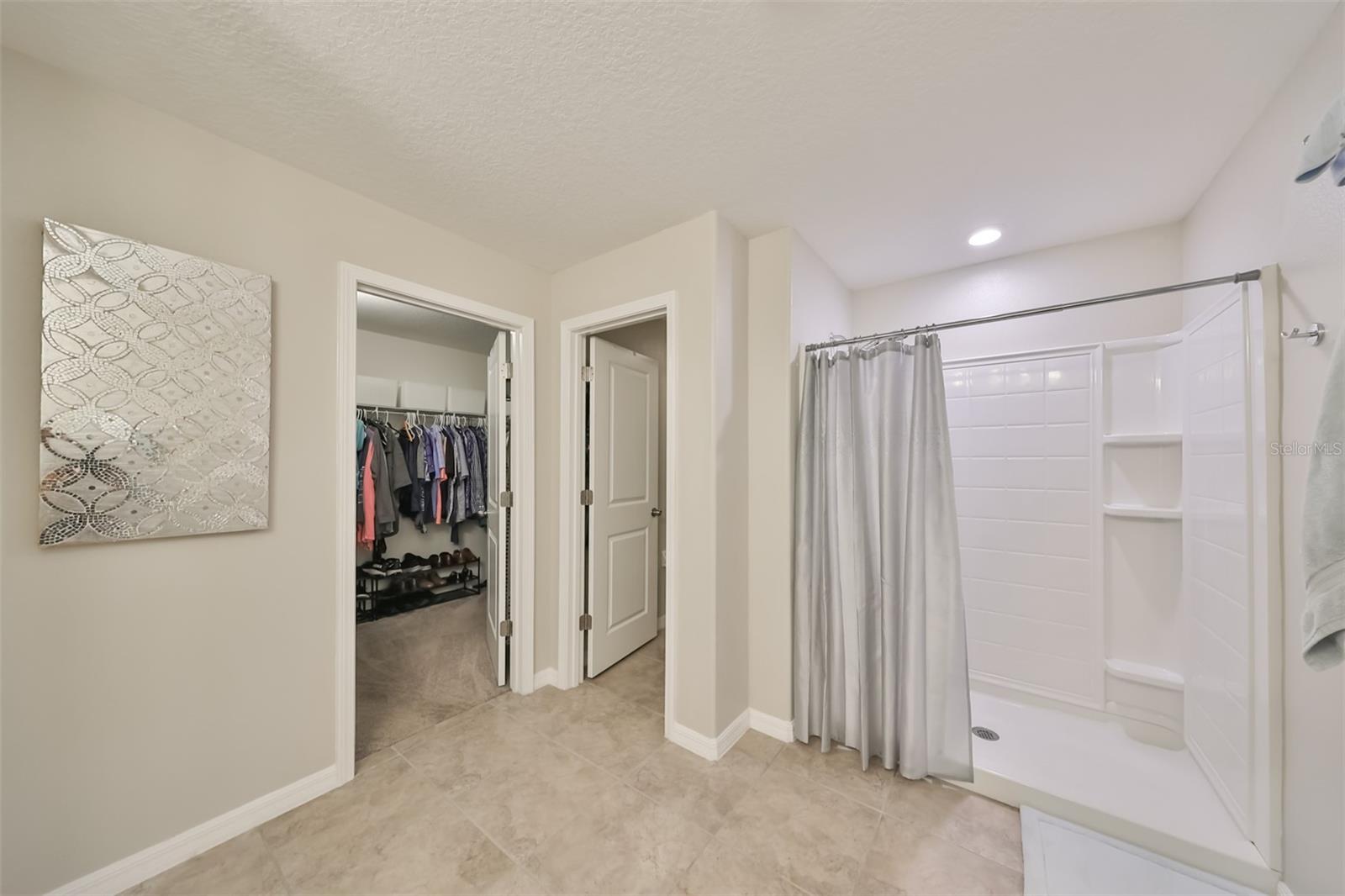 Large walk-in shower is big enough for two!
