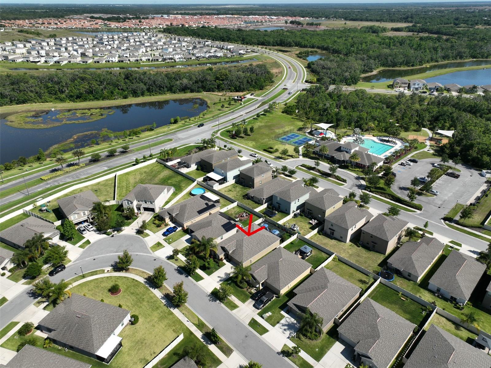 Aerial view.  See proximity of home to the club house and pool.