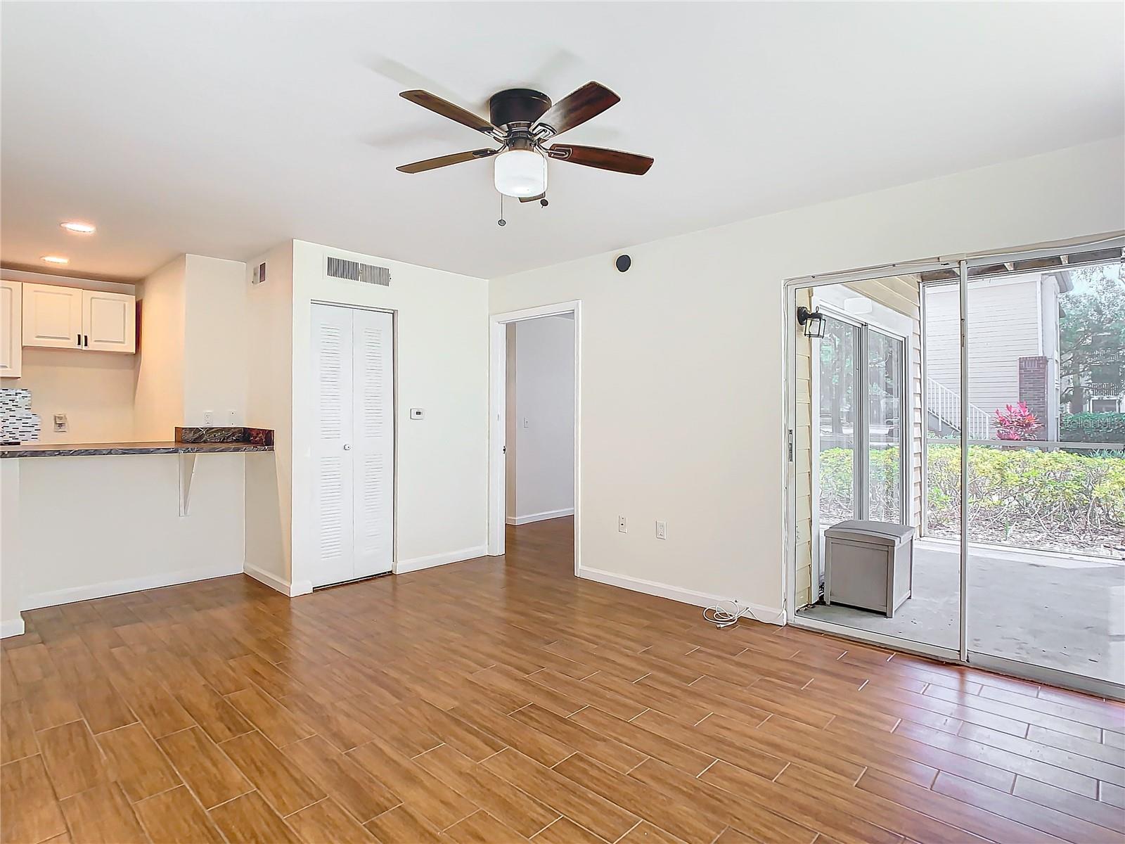 LR with view of Bedroom, Kitchen, Covered Lanai