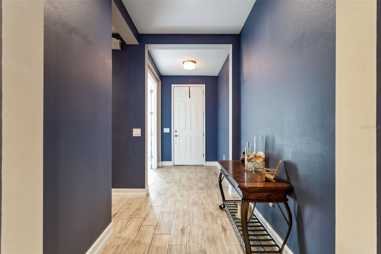 Your entryway leads to a split floorplan with 2 bedrooms up front separate from the Primary.