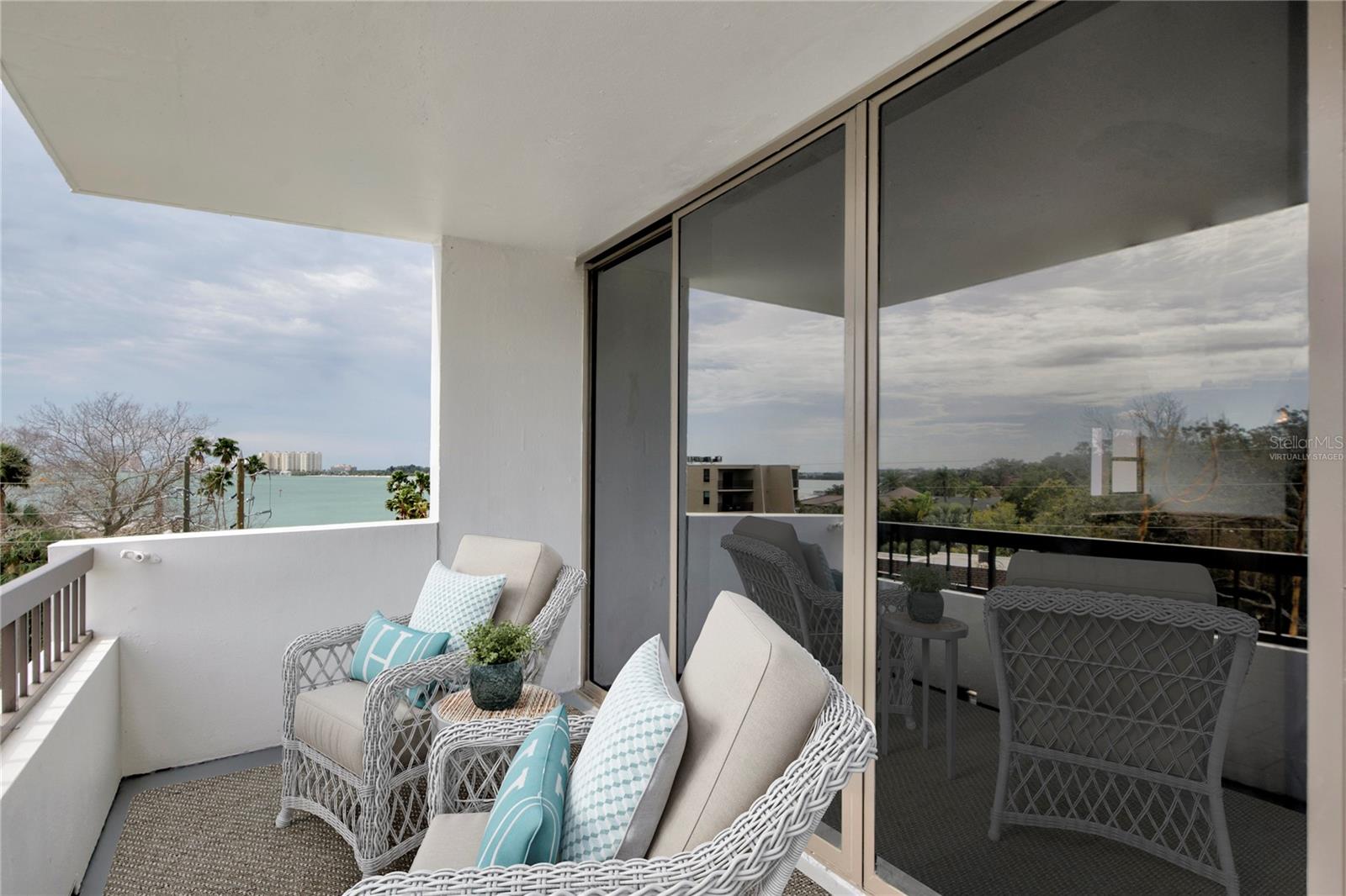 Corner unit with views of Clearwater Harbor from porch