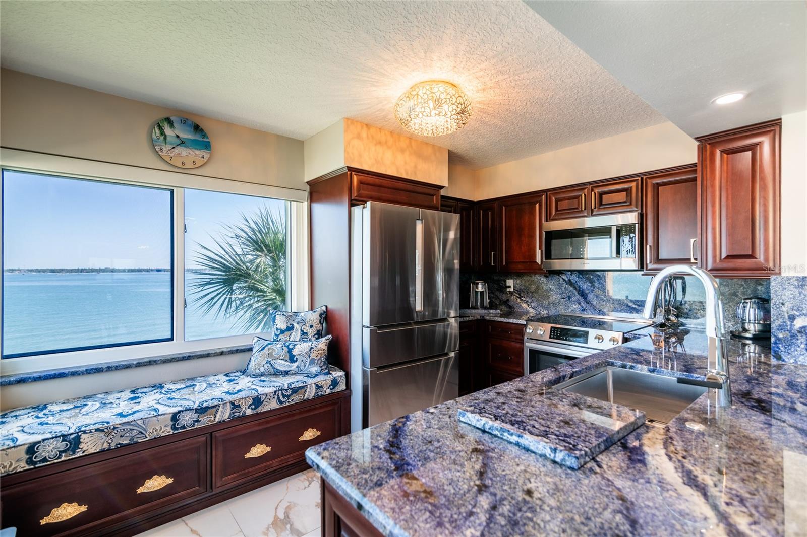Kitchen with custom window seat perfect for your morning coffee while enjoying the view.