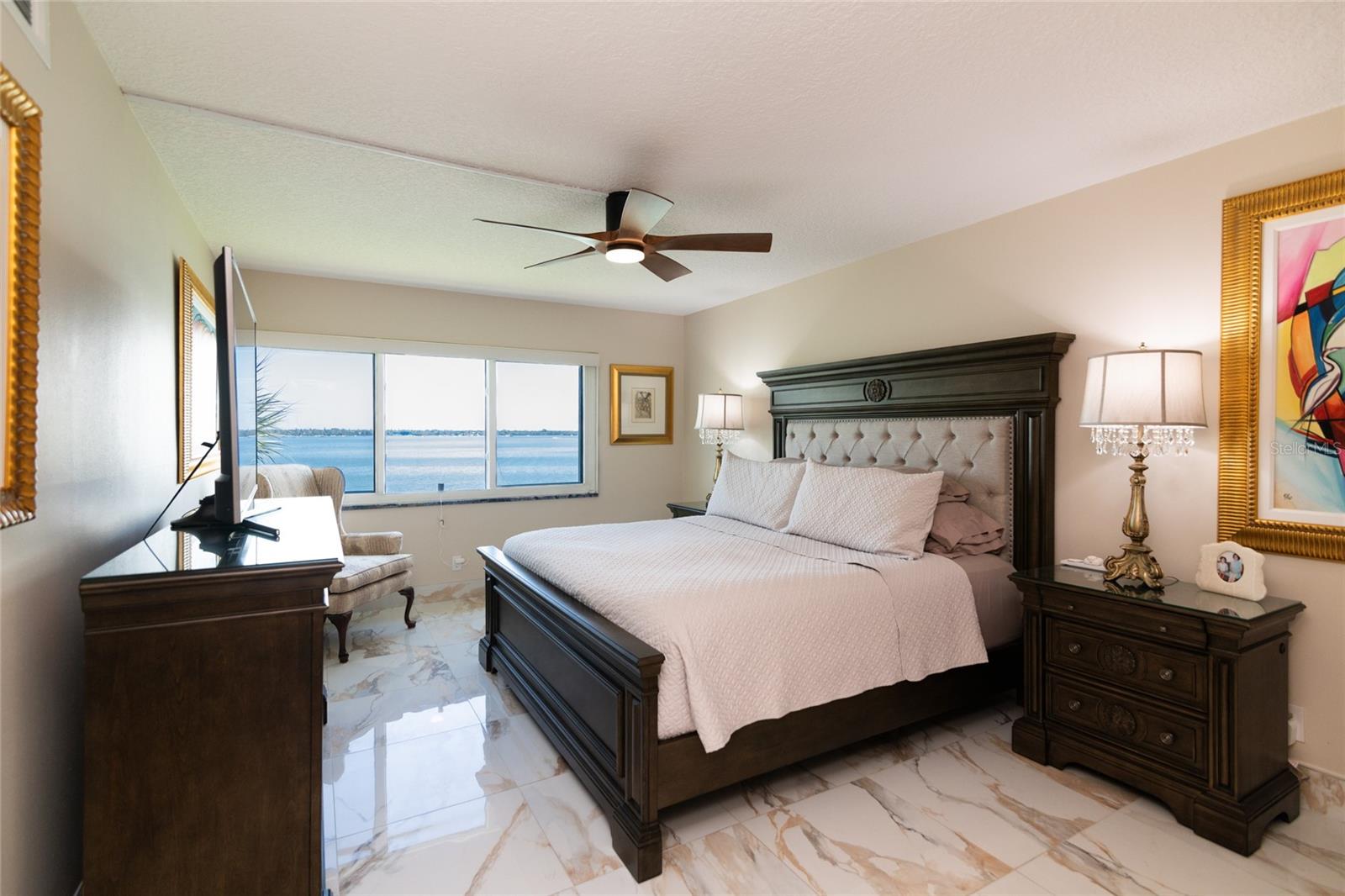 Primary bedroom - wake up to that gorgeous view of Boca Ciega Bay