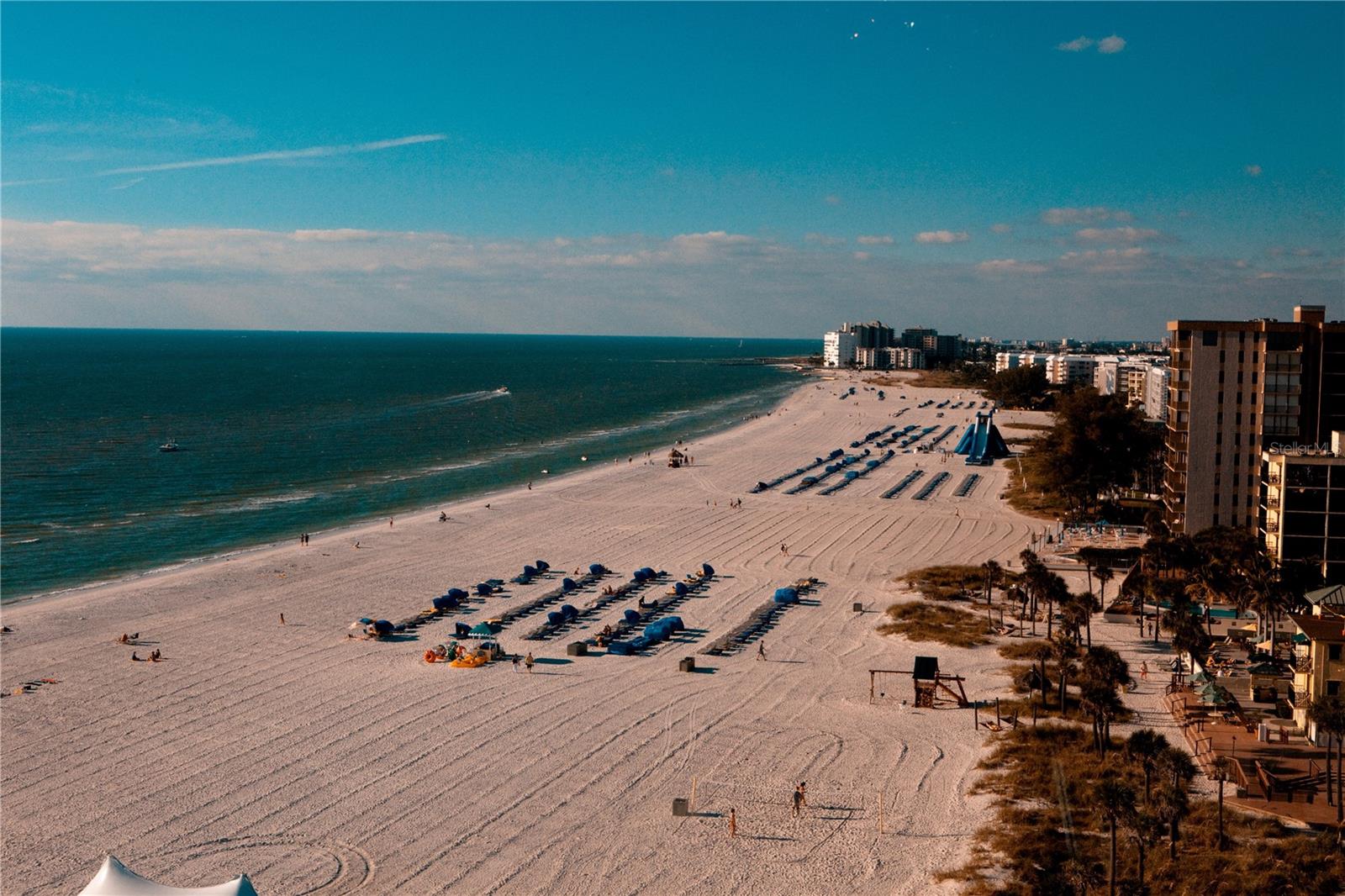 You are minutes to the beach with your toes in the sand.
