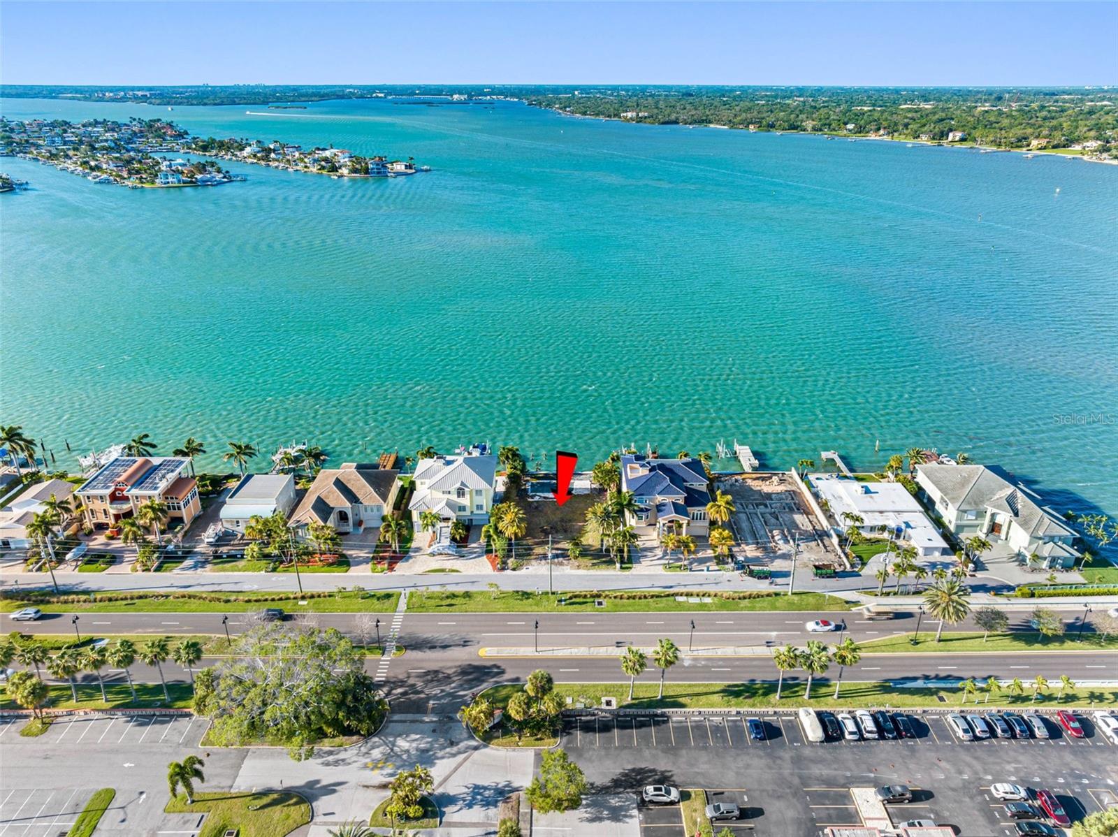 magnificent waterfront lot with WIDE LONG-RANGE VIEWS OF OPEN WATER