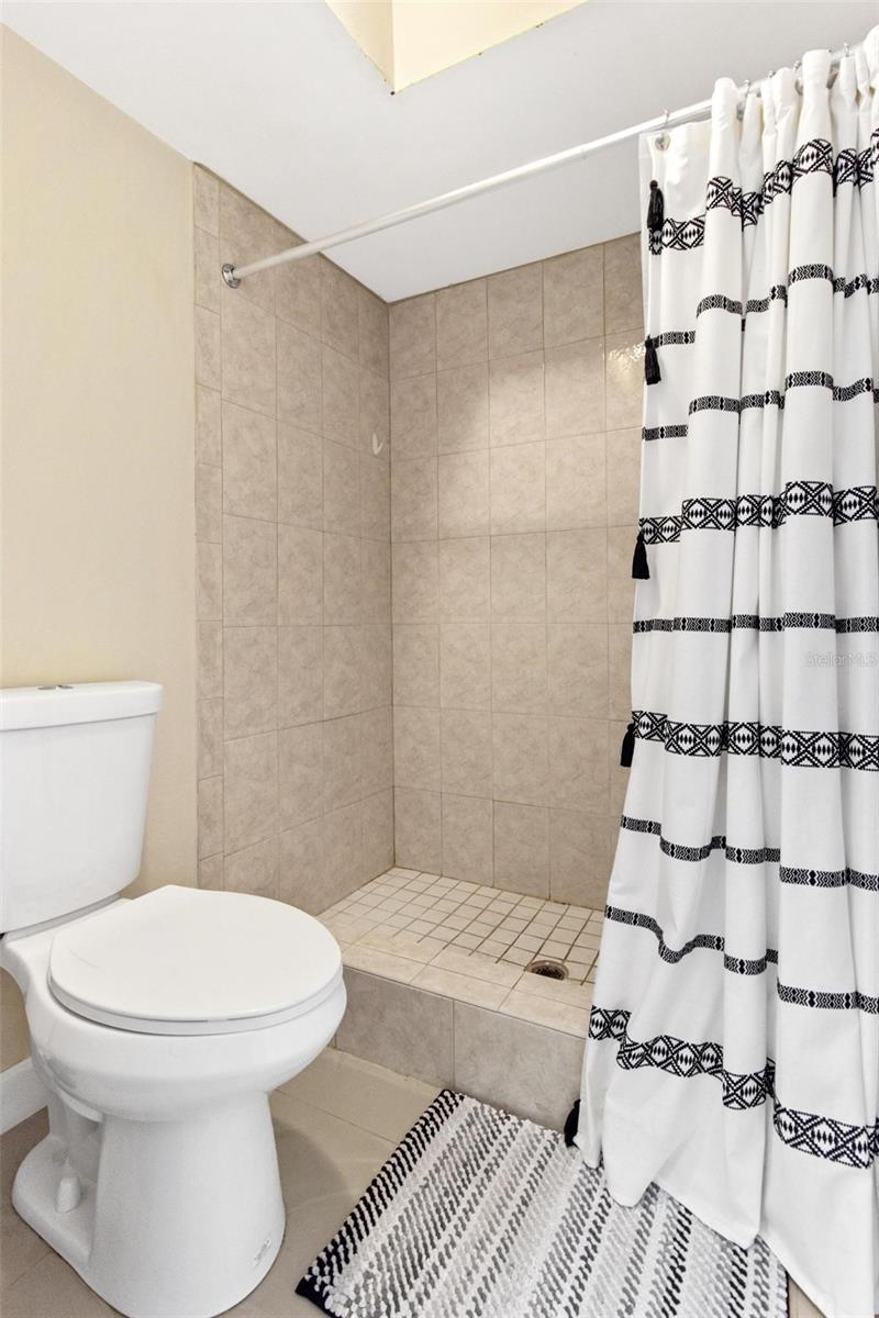 Separate primary Commode and shower area en suite