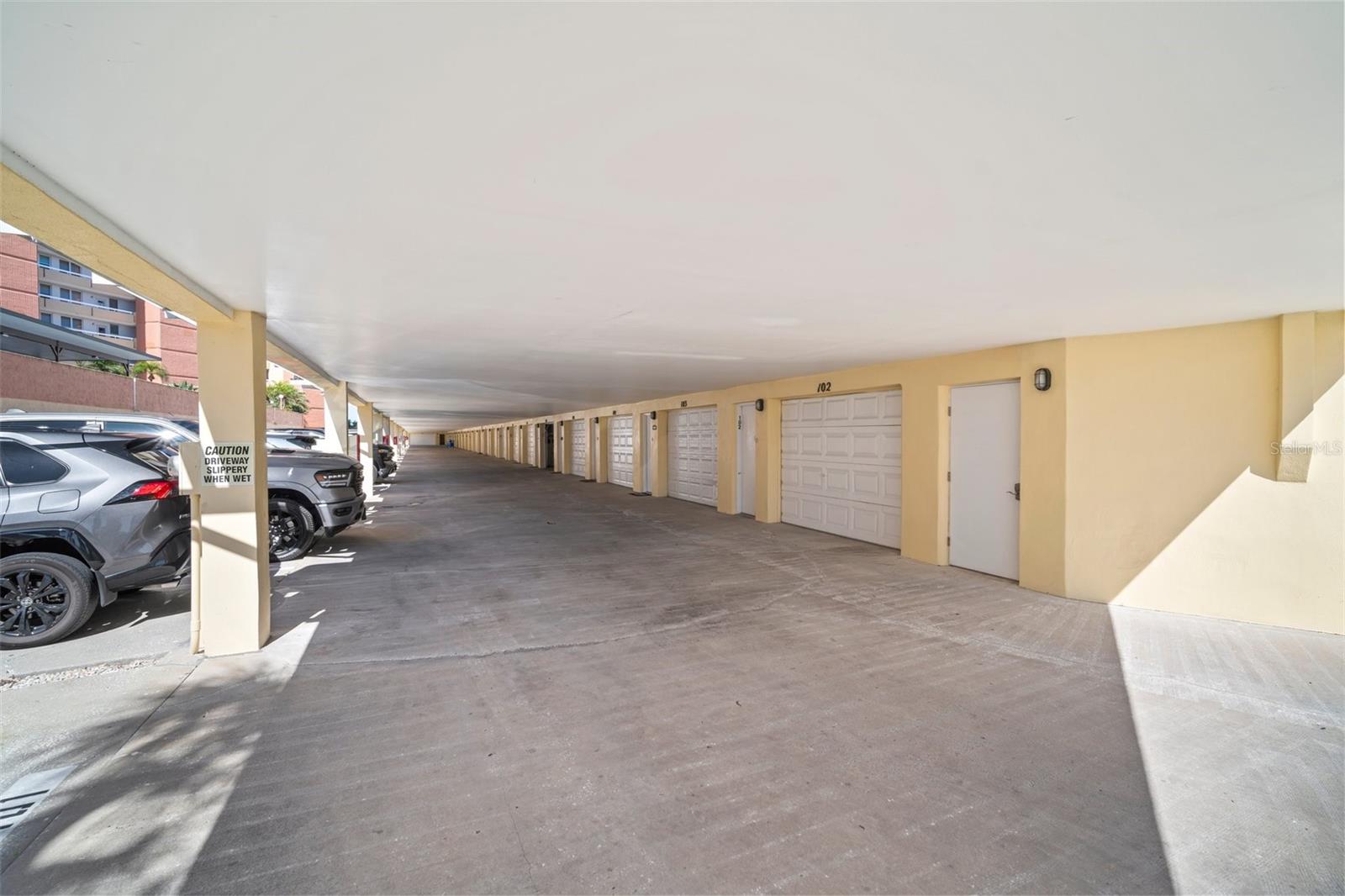 Two car garage with convenient assigned parking spot right next to 2 guest parking spots. Another fantastic benefit to this unit.