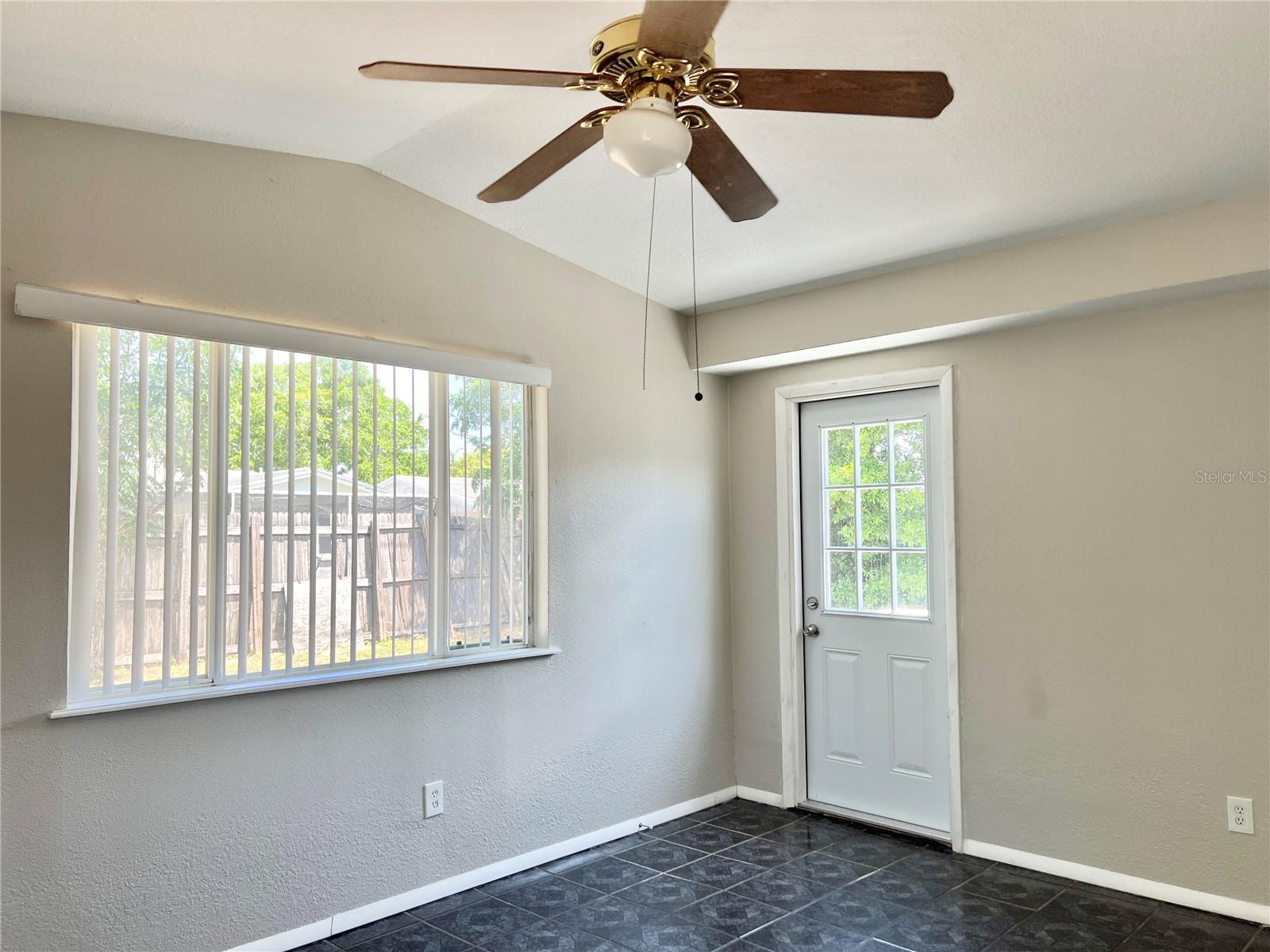 Family Room - Ceramic Tile Floors, Vaulted Ceilings and Ceiling Fan