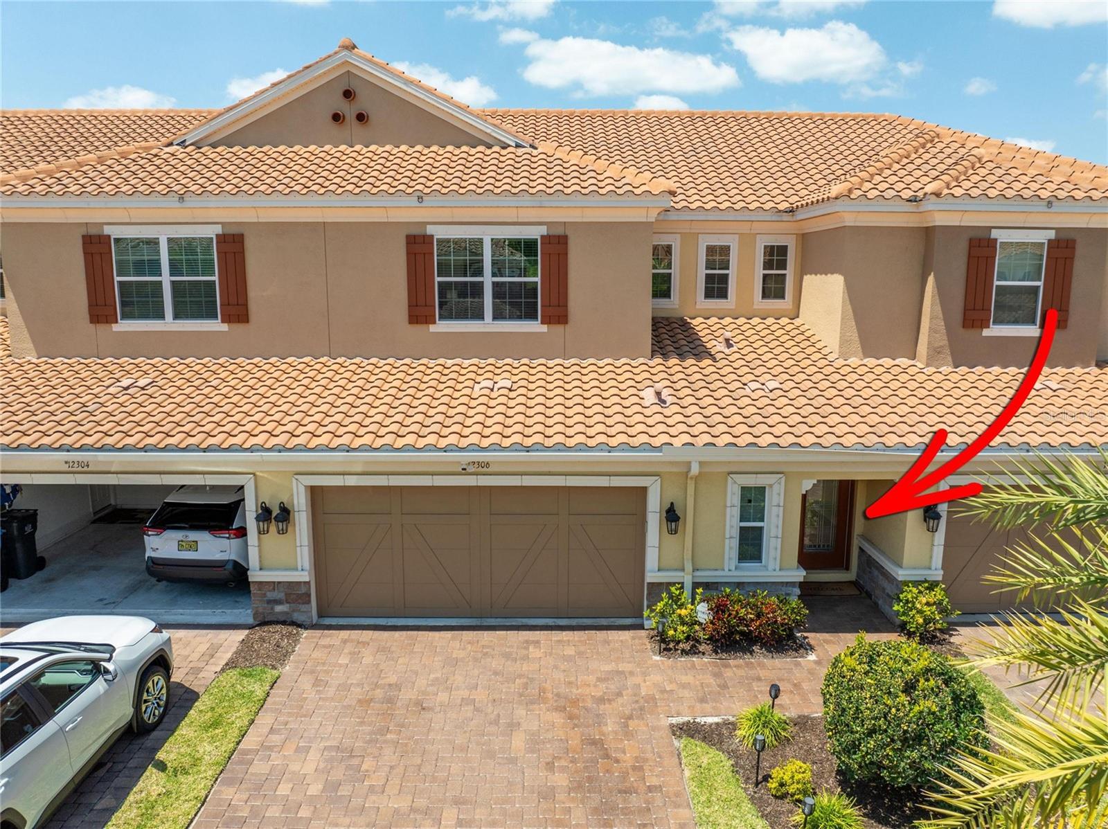 Exterior with arrow at 12306 Terracina Chase Ct, Tampa, FL 33625