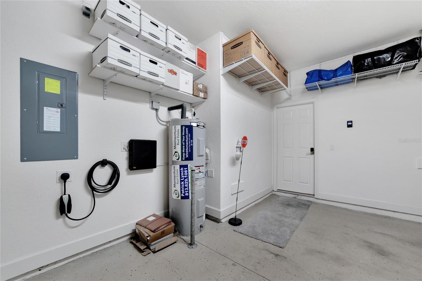 Storage & EV charging in garage at 12306 Terracina Chase Ct, Tampa, FL 33625