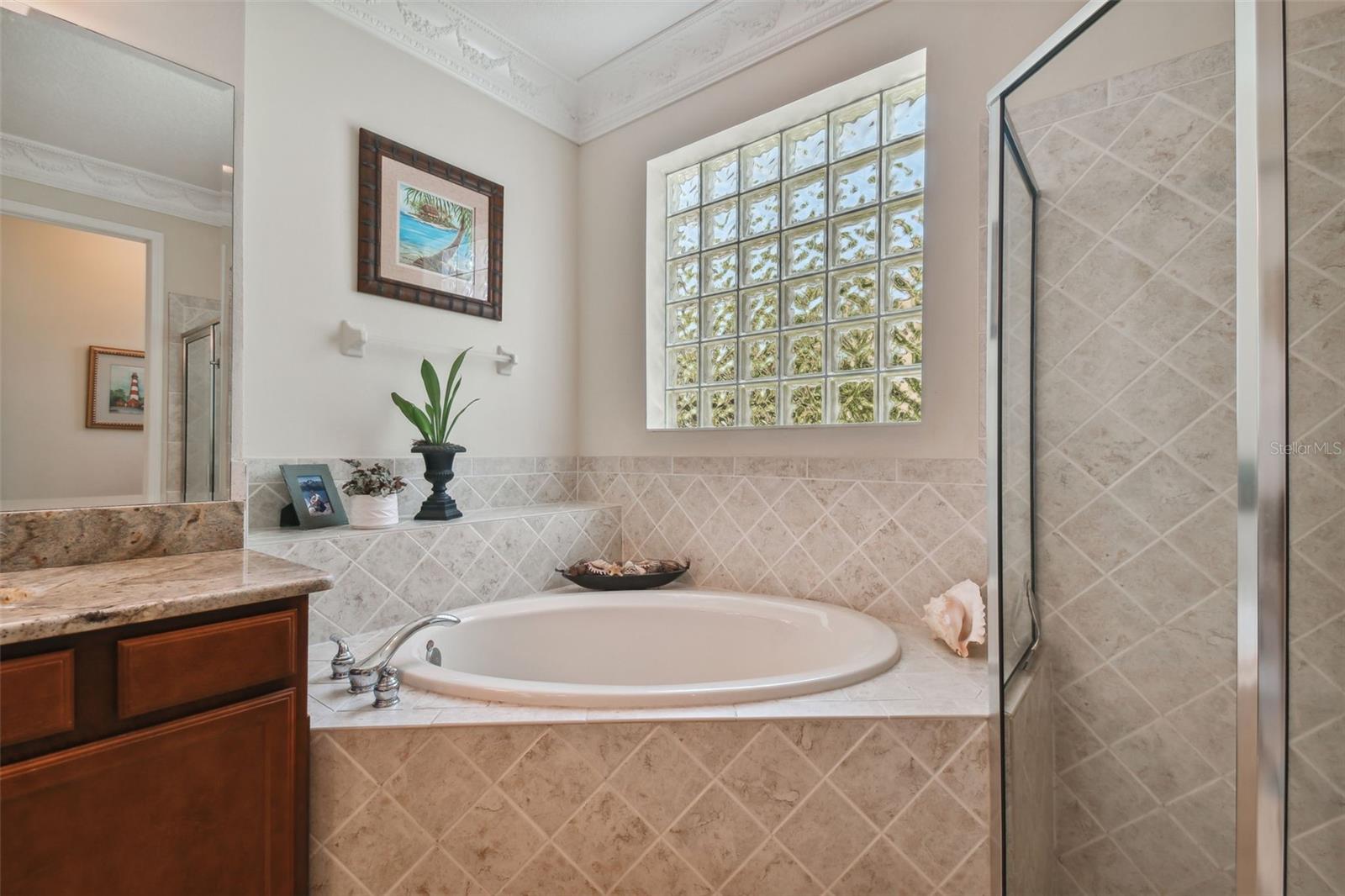 Soaking tub with upgraded fixtures