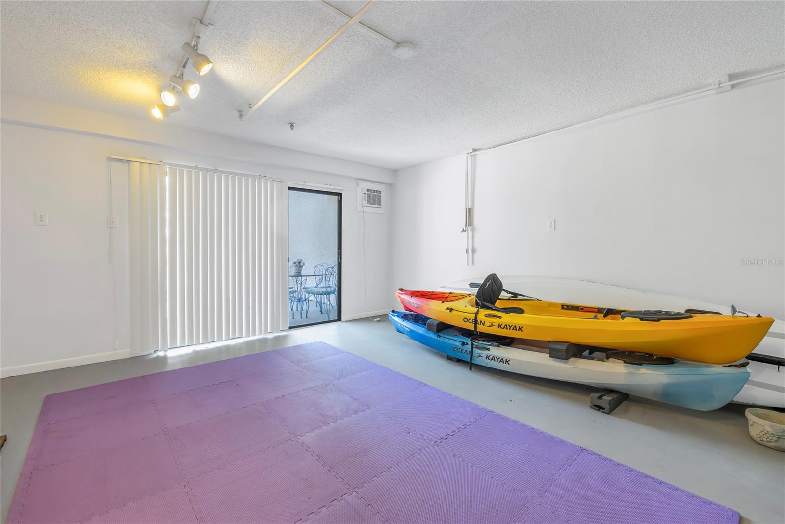 Bonus room for storage behind the garage leads to a patio