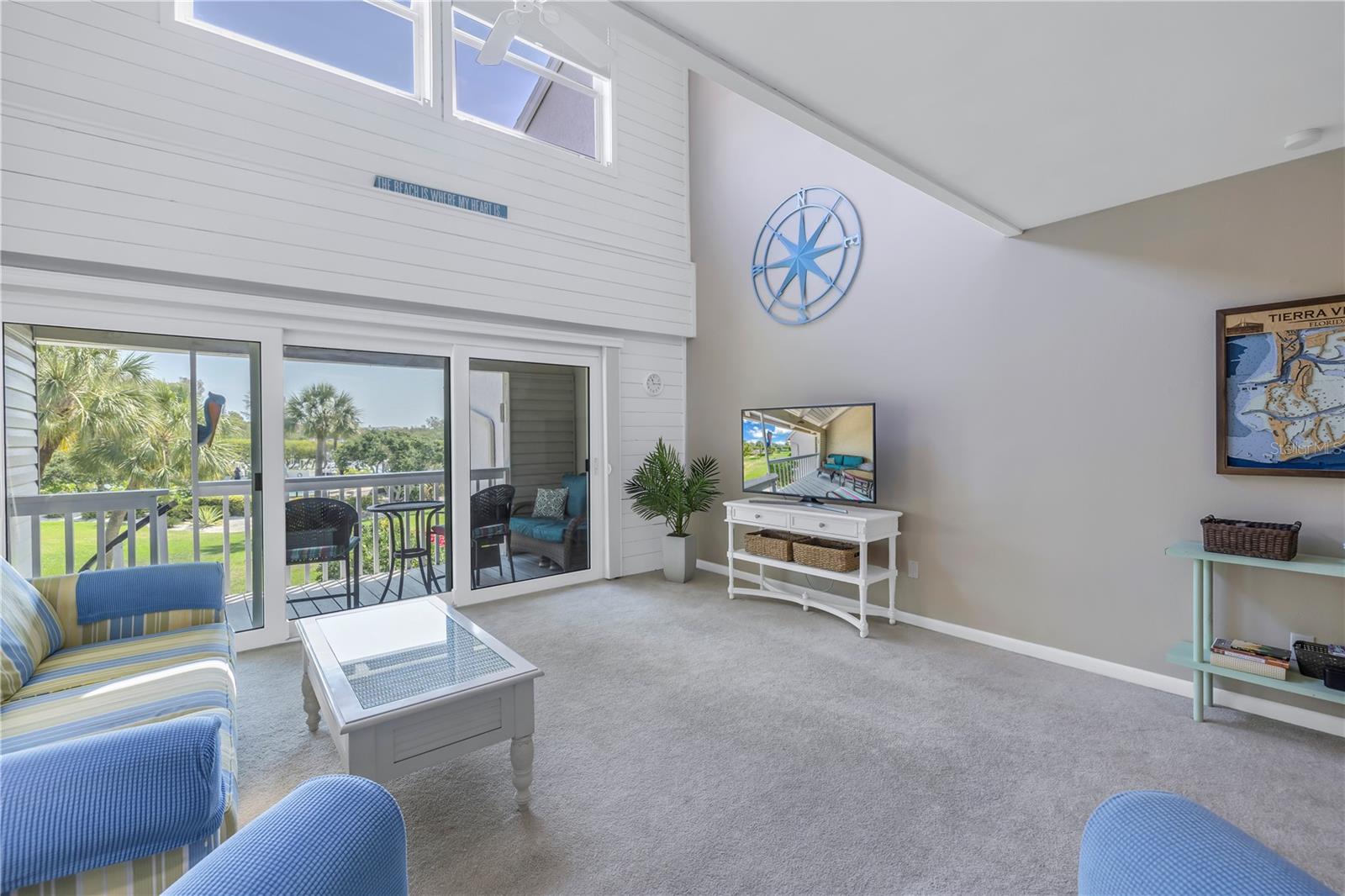 Living room is airy and bright