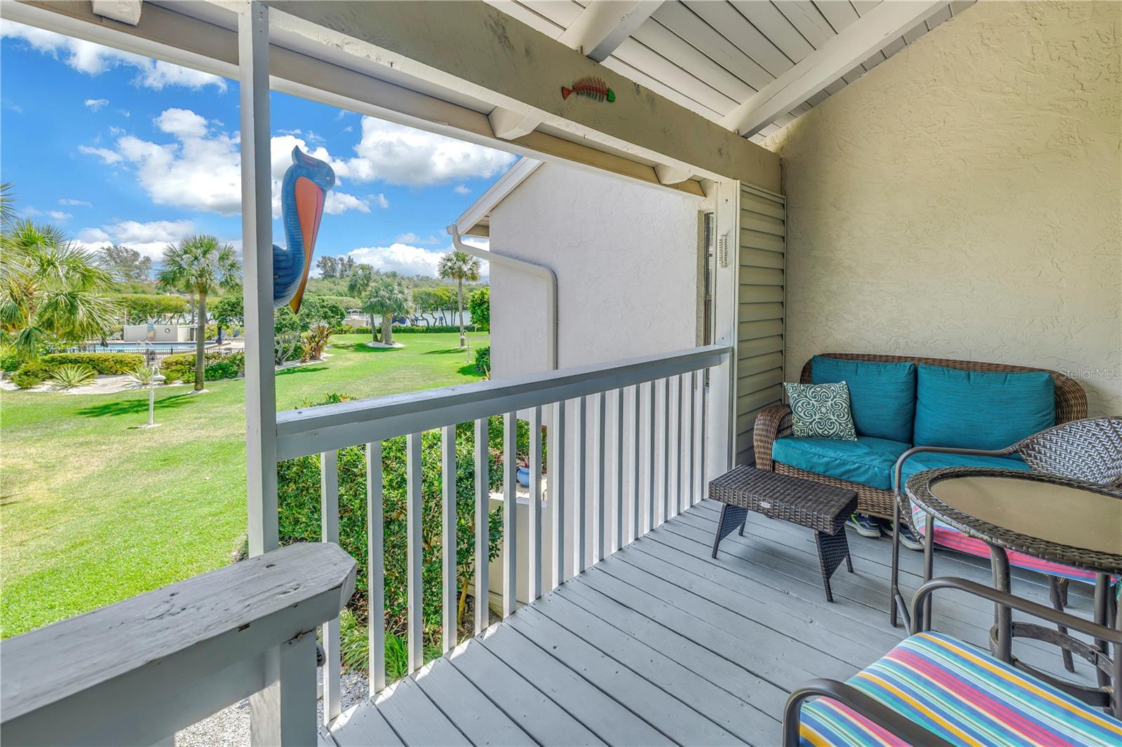 Private balcony overlooking the lush grounds