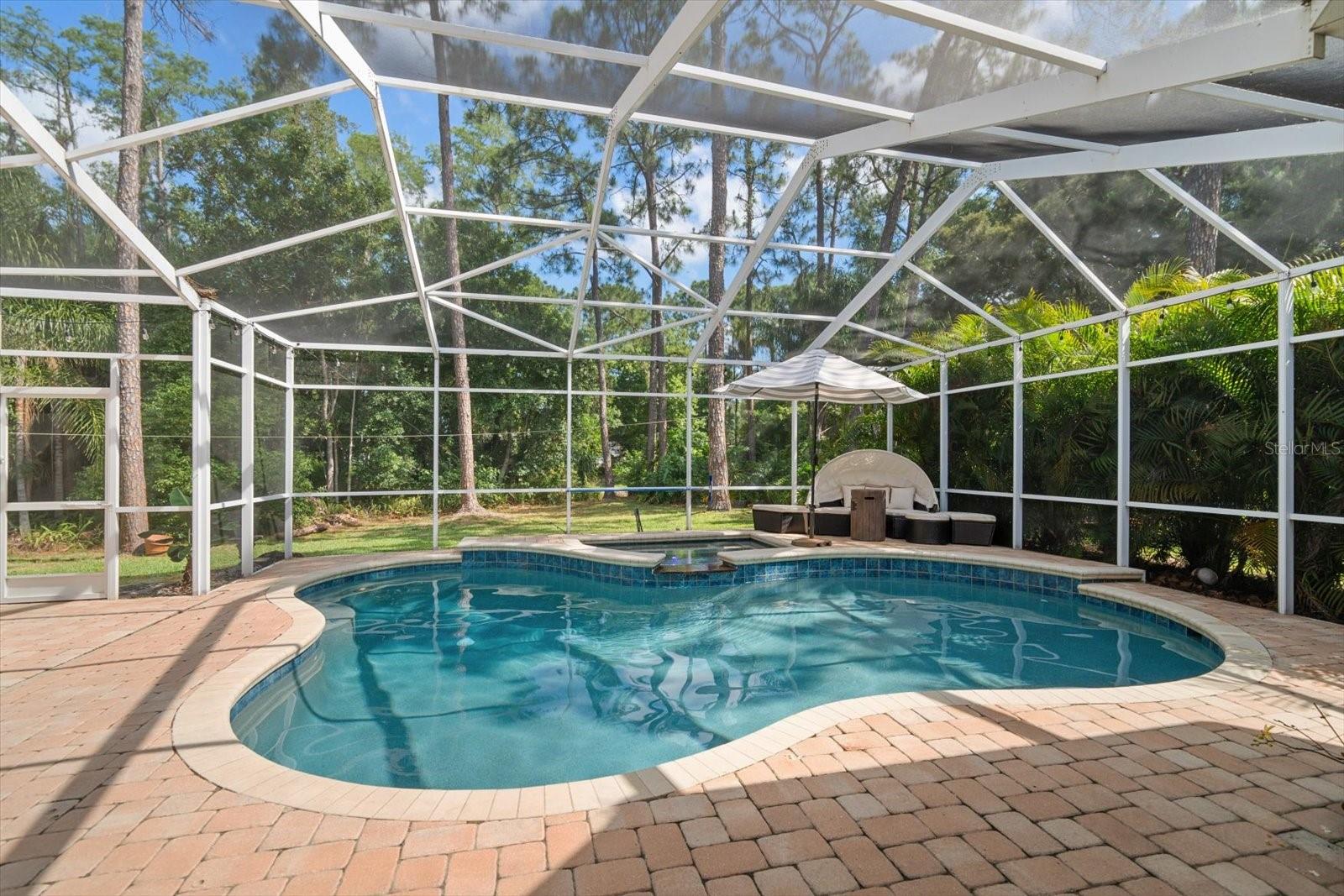 Gorgeous pool area with paver patio