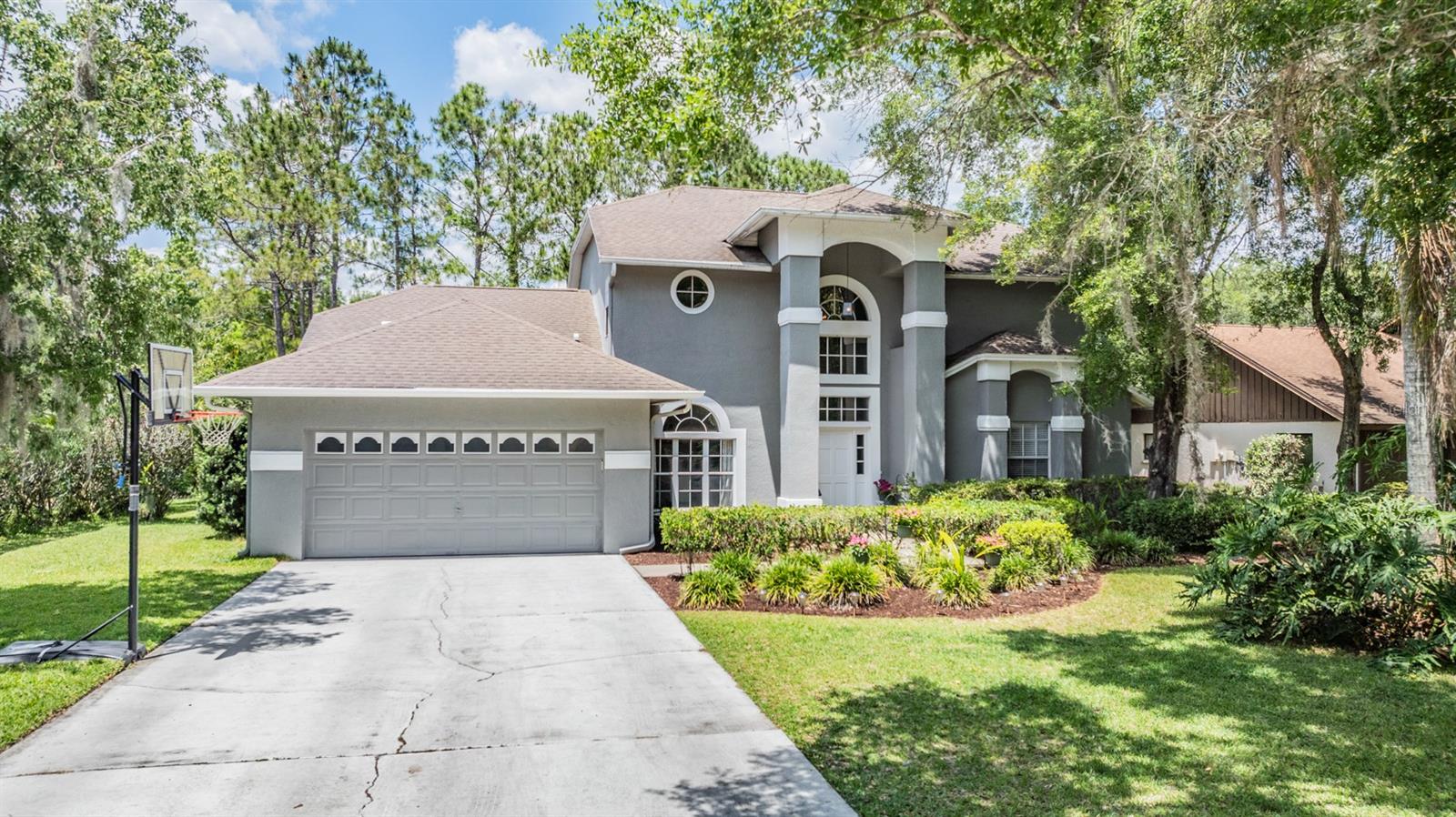 Front Exterior - 4 Bedrooms/3 Bathrooms/2 Car Garage Pool home with water access!  (3083 Sq Ft)