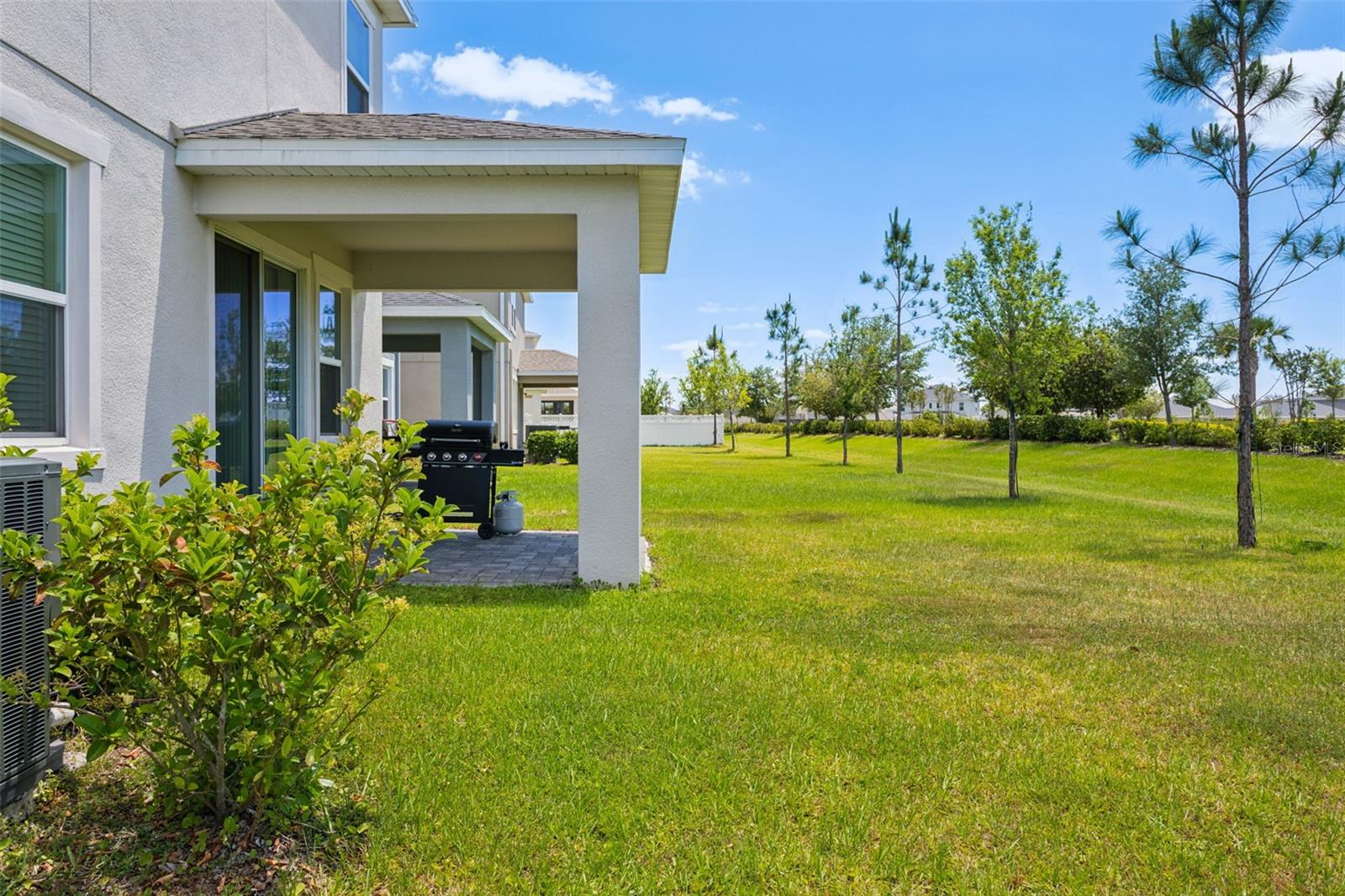 The backyard can be fenced in with 6' privacy fencing, screen in or extend your patio area!