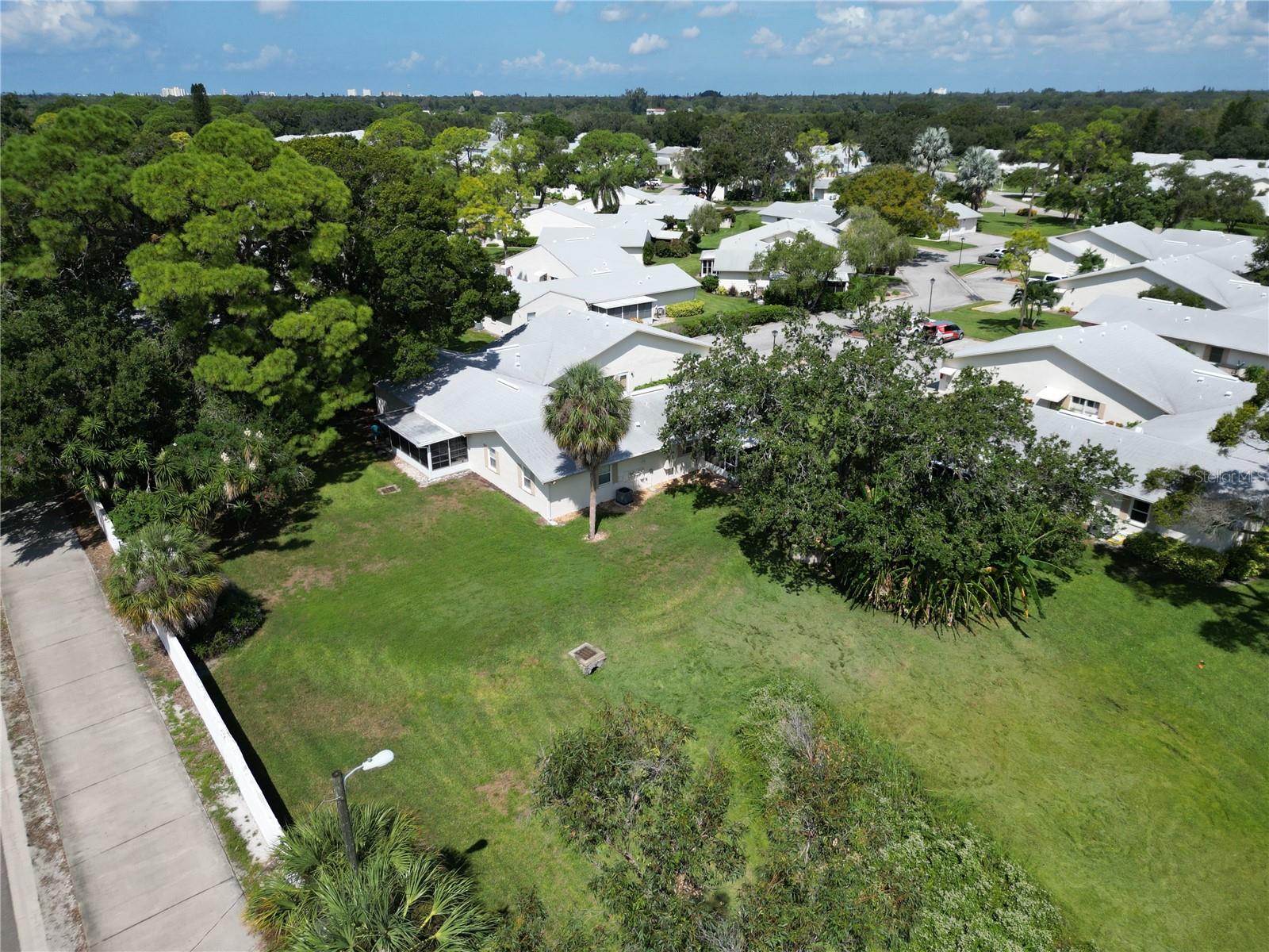 CORNER UNIT WITH VIEW OF RETENTION POND