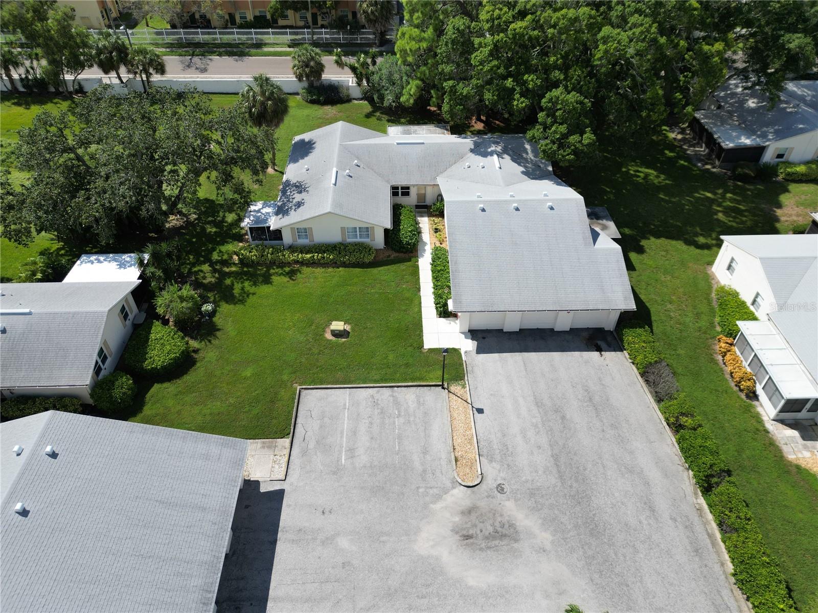 VIEW OF GARAGE AND SUBJECT PROPERTY