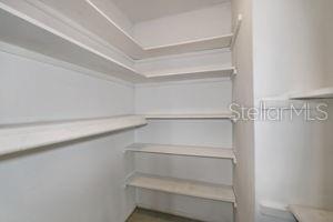 Tons of storage in one of two walk in closets ~