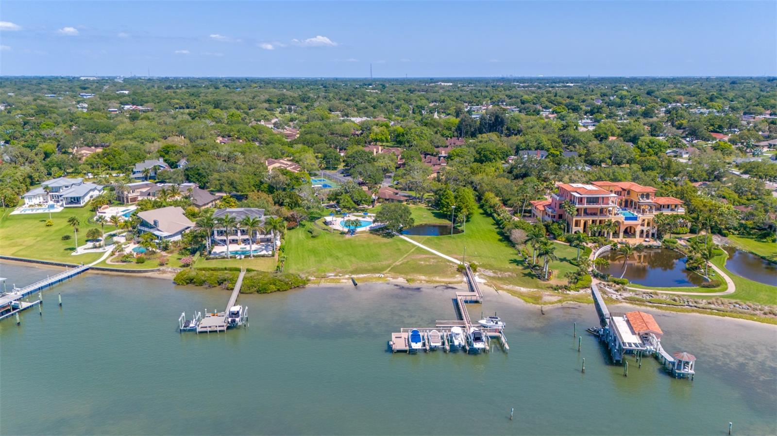 Aerial view from Intracoastal, push in from shoreline with paddleboard