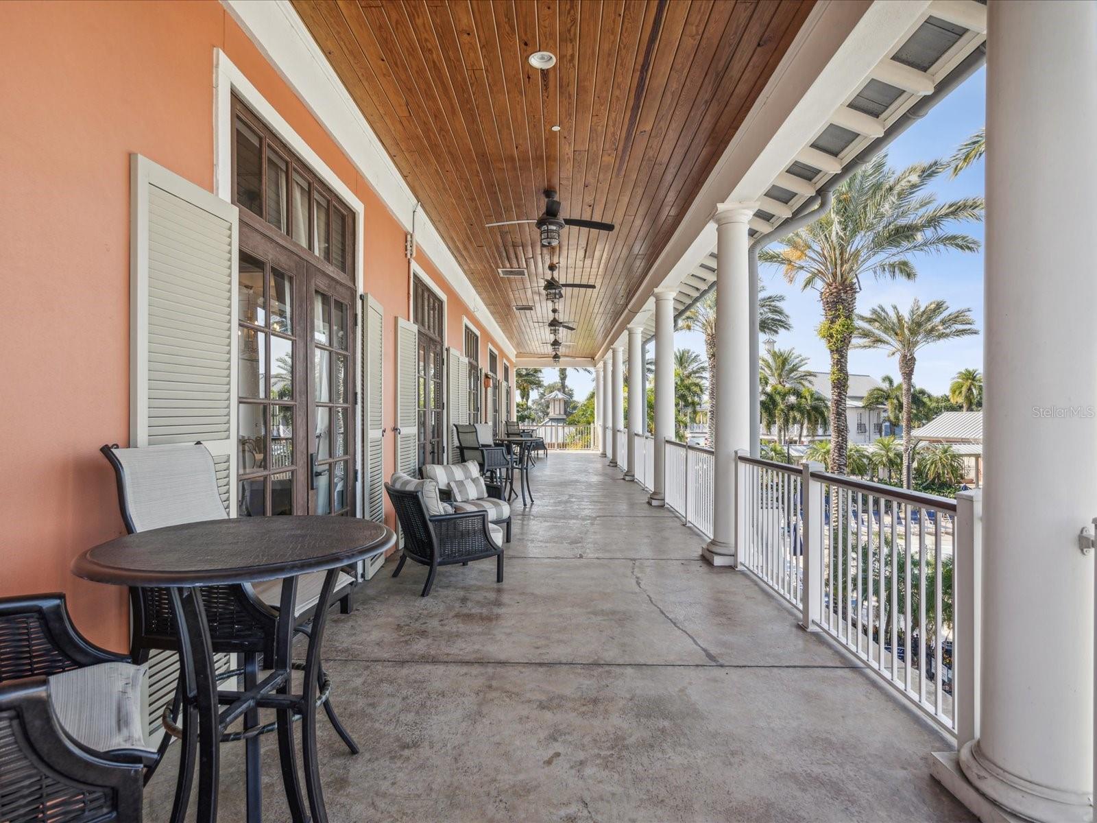 Bar tables and stools line the south facing veranda. This is a great spot to enjoy the southerly breeze and the beautiful view of the lagoon and the pool.