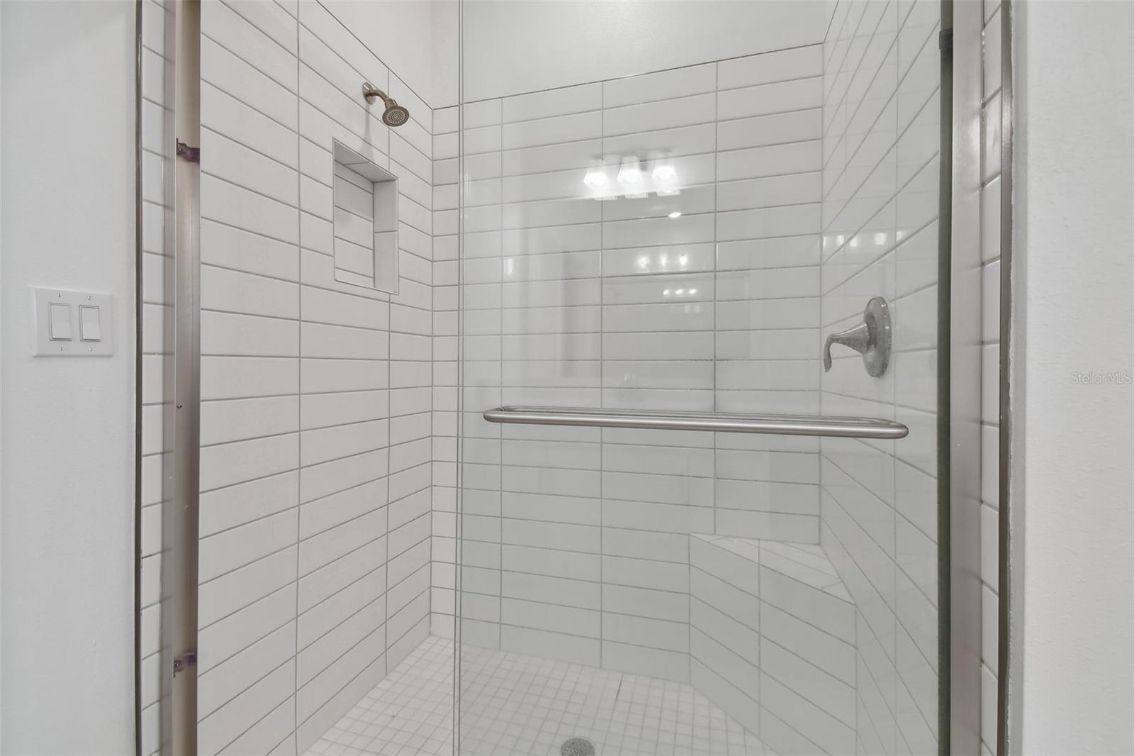 primary shower with subway tile