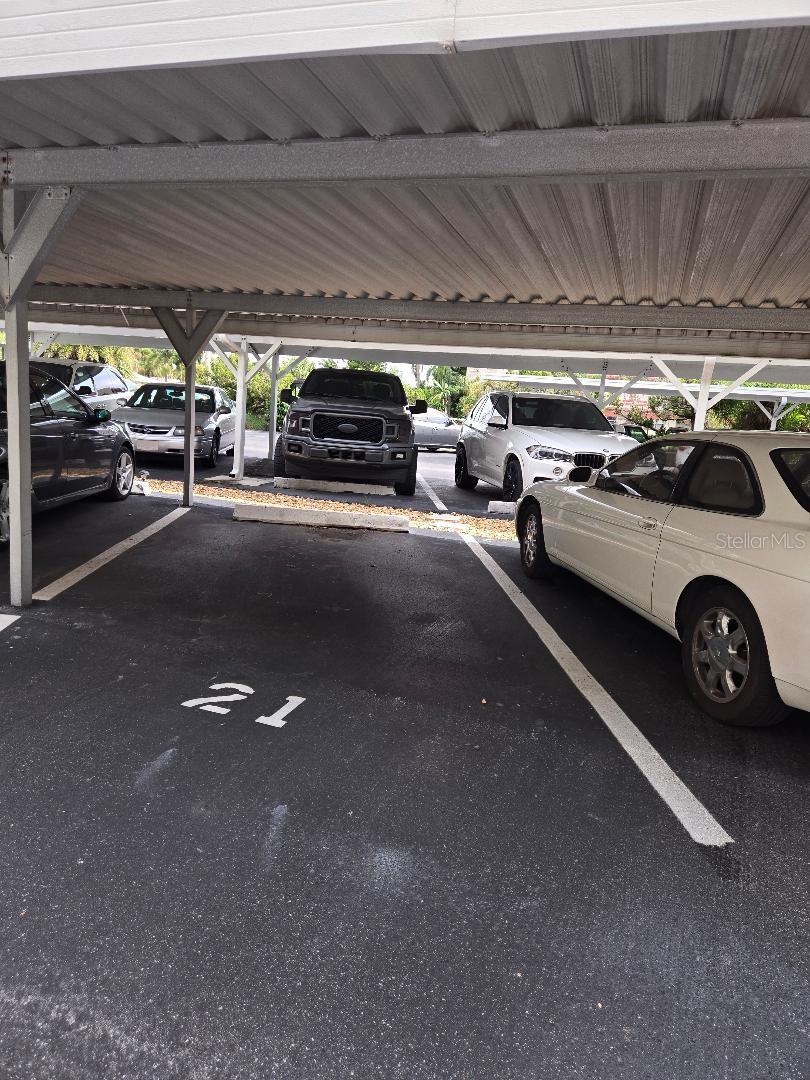 ASSIGNED COVERED CAR PORT