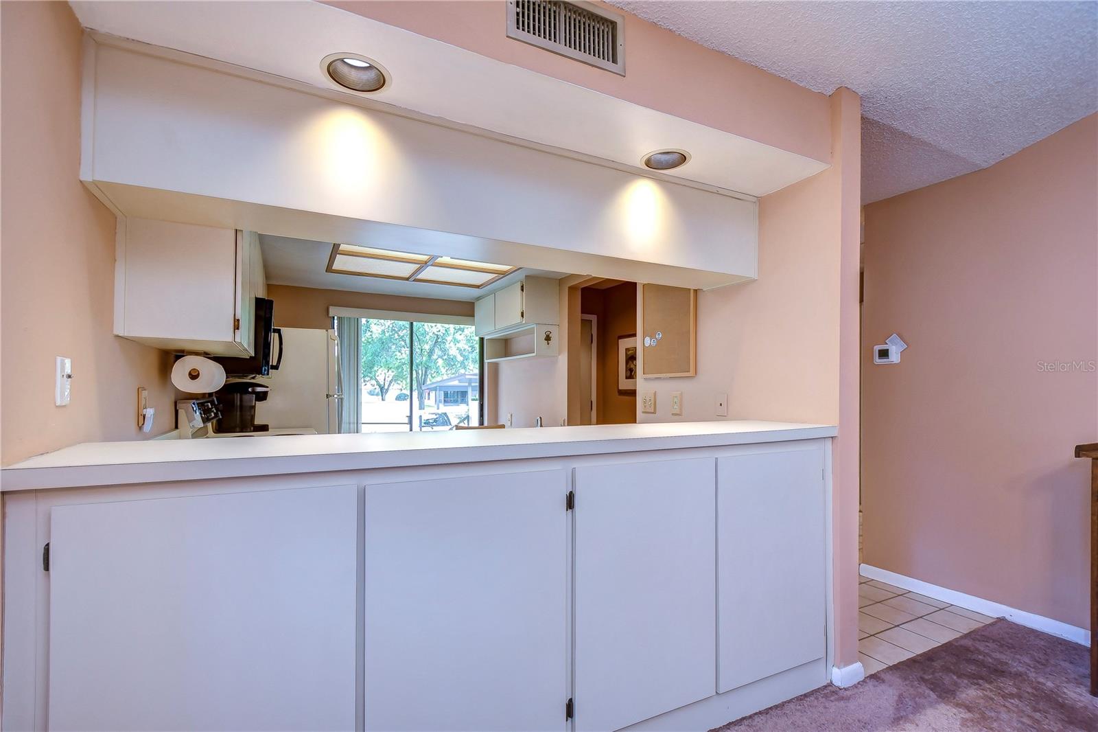 Breakfast bar with cabinets for extra storage!