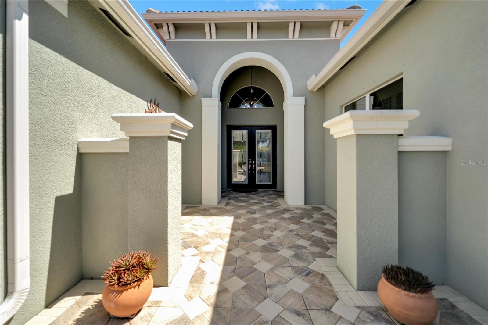 Exterior Front Courtyard Entry