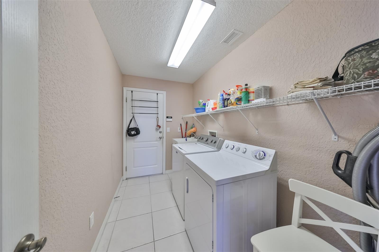 9. Laundry Room with entry to garage
