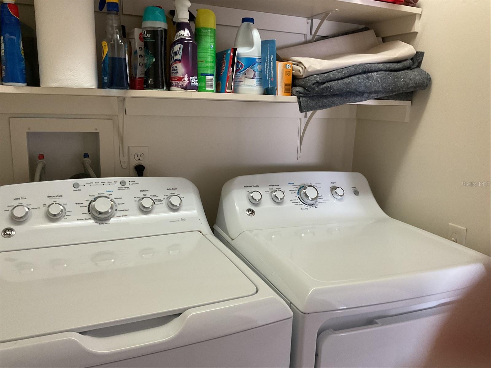 Laundry room in hallway (washer and dryer stay)