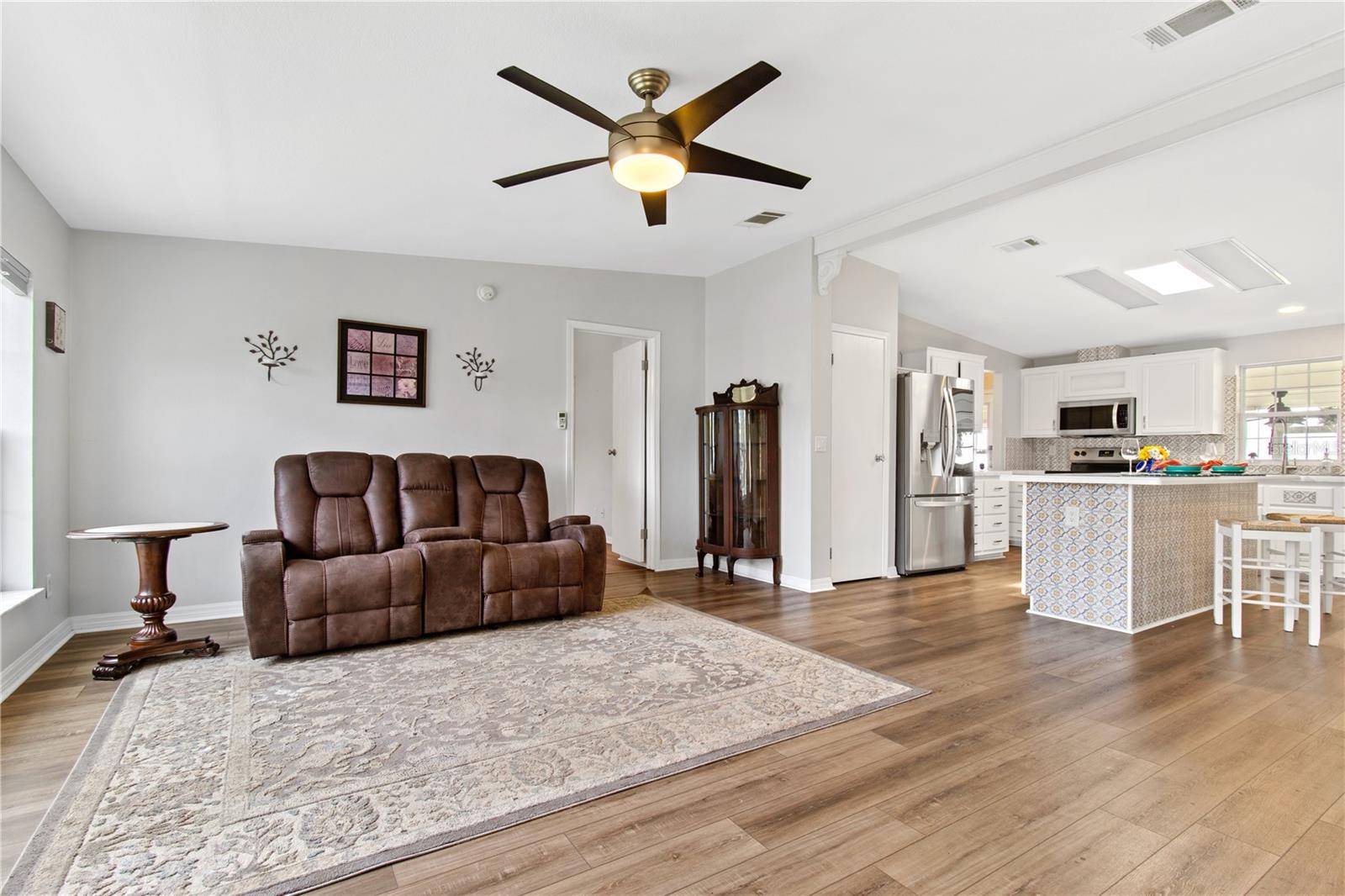 Combo living room, kitchen, dining room.