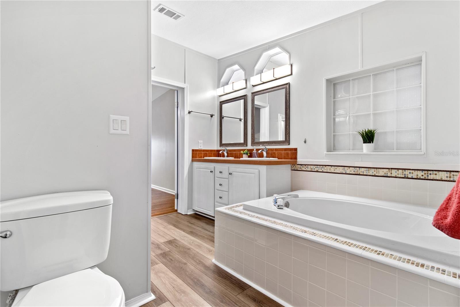 Primary bathroom with large soaking tub.
