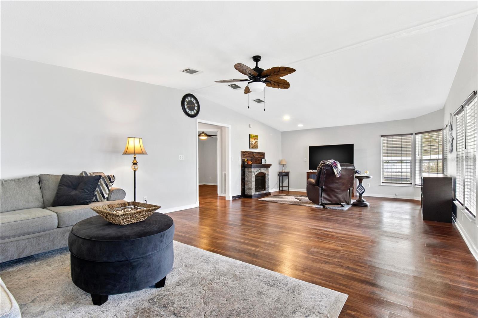 Durable vinyl flooring throughout the home.