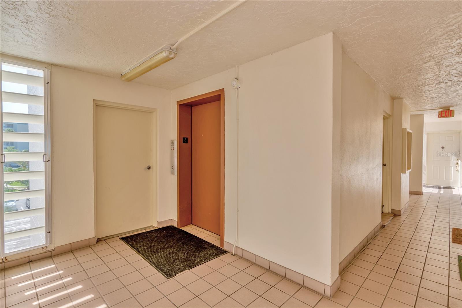 Unit 302 is located Conveniently Close to the Elevator - only steps away!