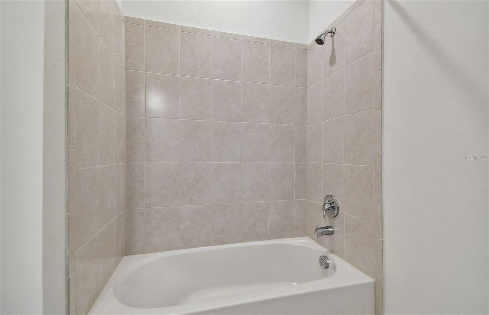 Shower/Tub Combo in Bedroom 3's Bath