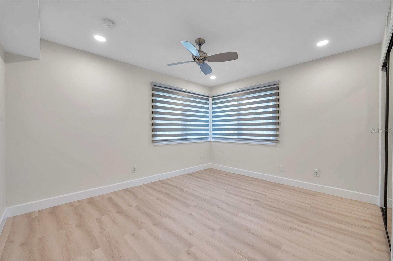 BEDROOM 2 - RECESSED LIGHTING AND MODERN FANS