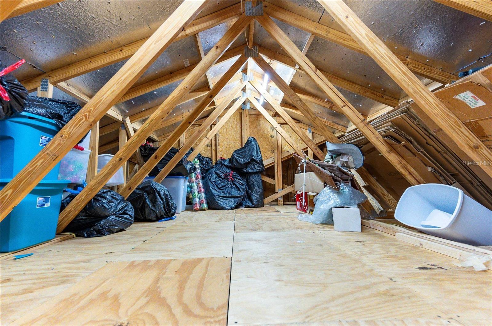 Garage attic offer additional storage.