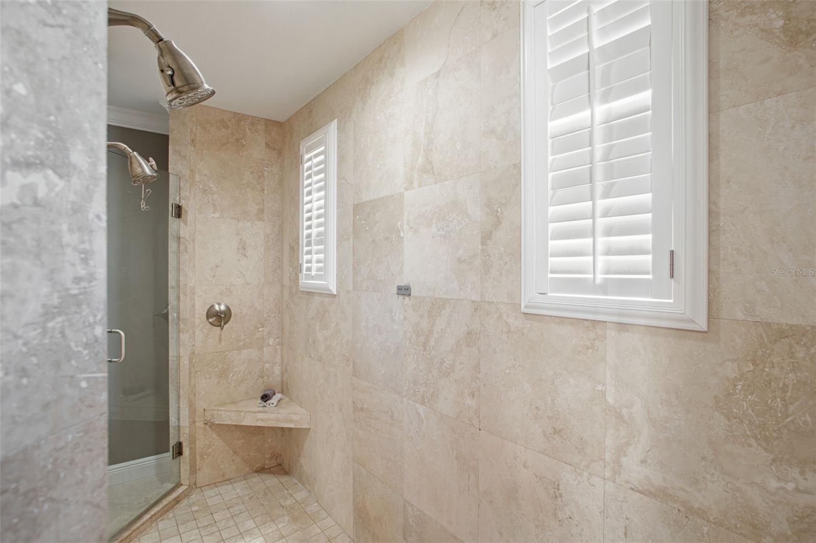 Master shower with separate entrances and dual shower heads.
