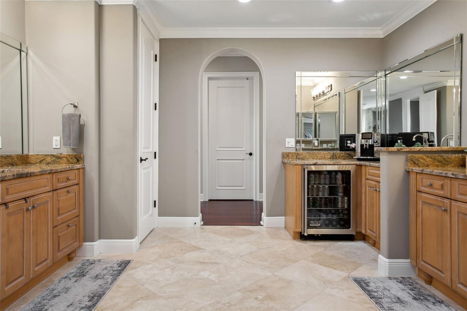 Master bath with wet bar and mini fridge.  Perfect for a private coffee bar.