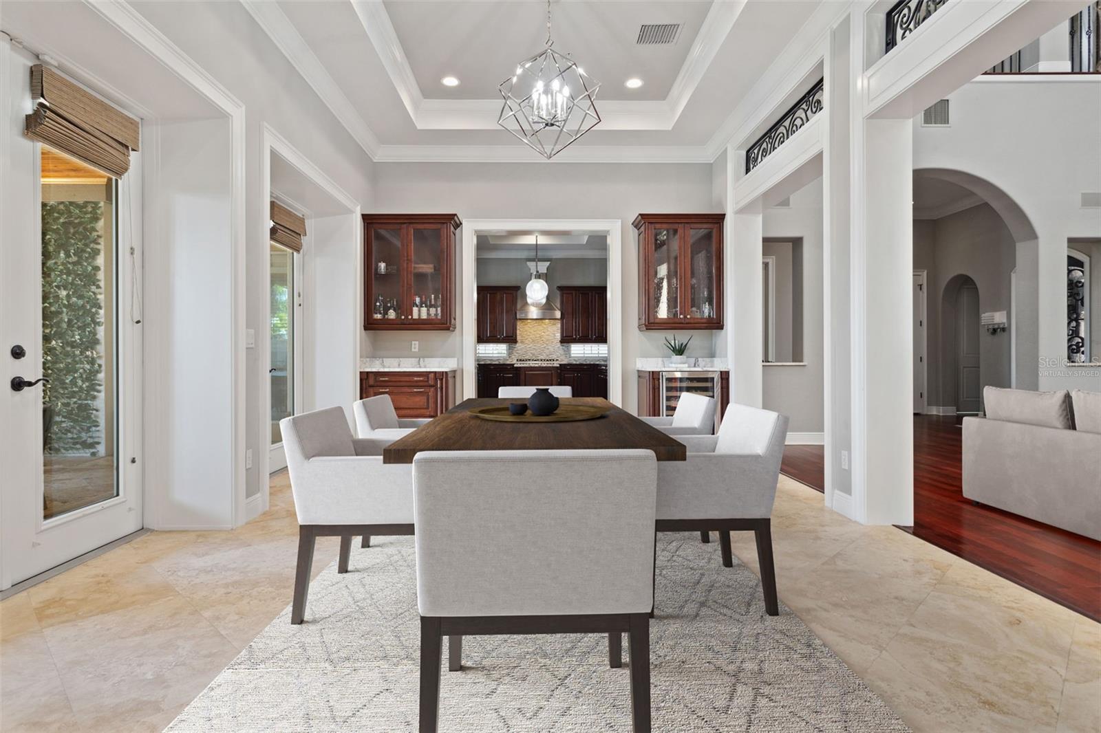 Virtually staged formal dining room.